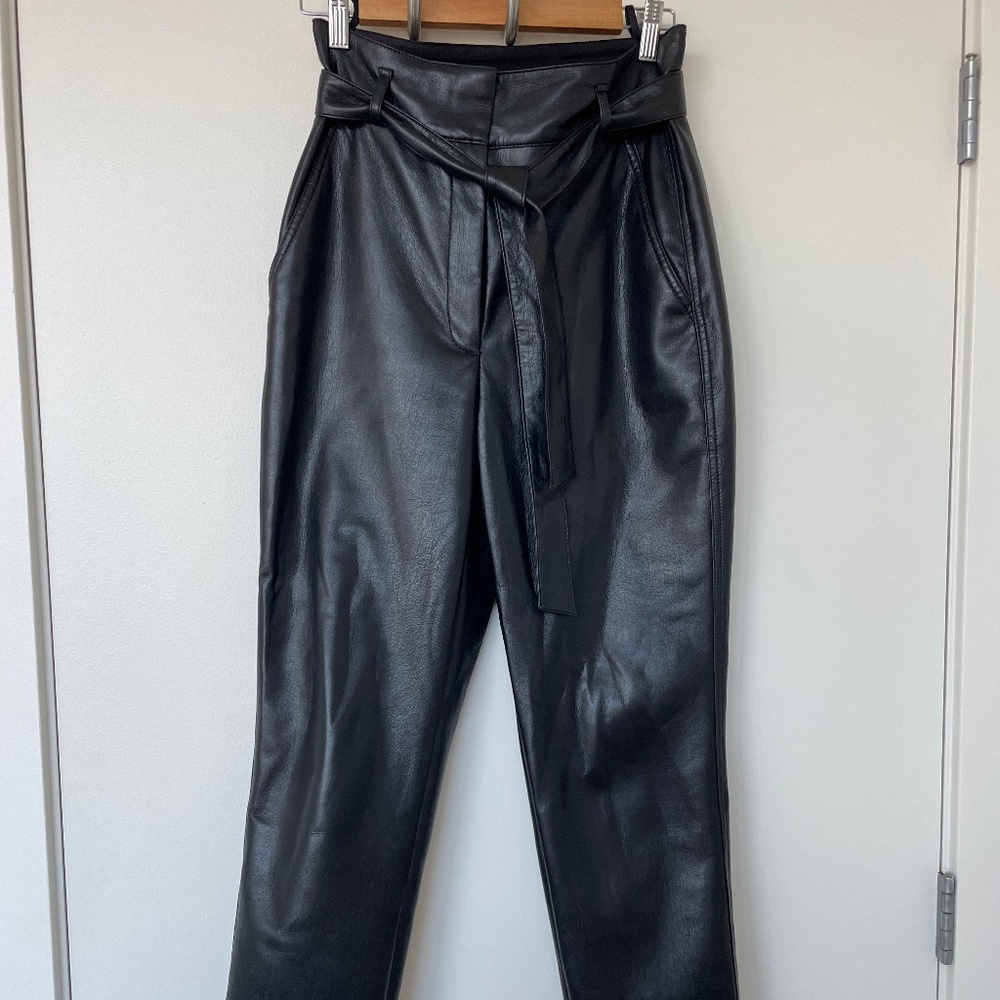 High-rise Babaton (Aritzia) vegan leather pants with tie waist